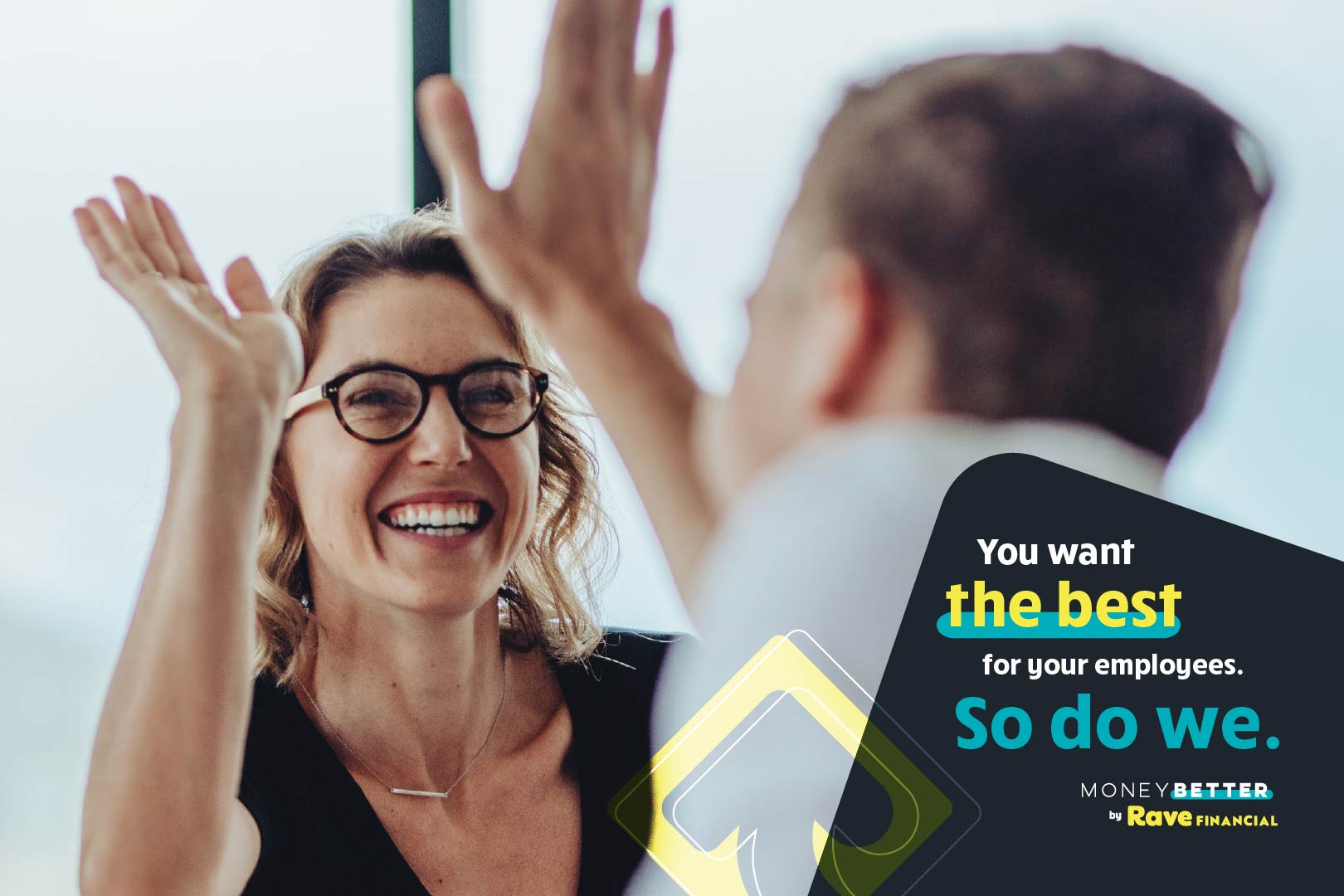 Two employees giving each other a high five