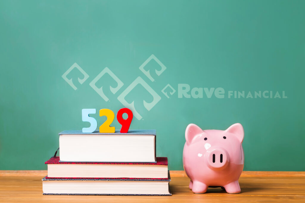 529 college savings plan theme with textbooks and piggy bank