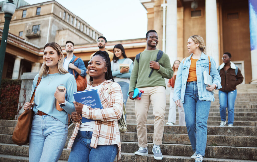 group of college students walking down stairs