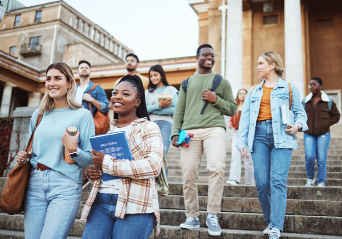 group of college students walking down stairs